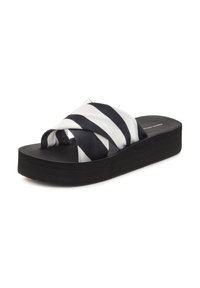 Platform sandals with a black rubber sole, featuring a woven crossover strap in white and navy stripes. Smooth fabric texture.