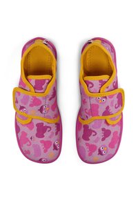Pink fabric shoes with yellow closures, featuring a playful animal pattern. The shoes have a soft texture and round, reinforced toe design.