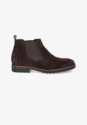 Brązowe zamszowe botki Chelsea z elastycznymi bocznymi panelami, pętelką do zakładania i teksturowaną gumową podeszwą. Posiadają gładką osłonę palców i kontrastowe szwy.