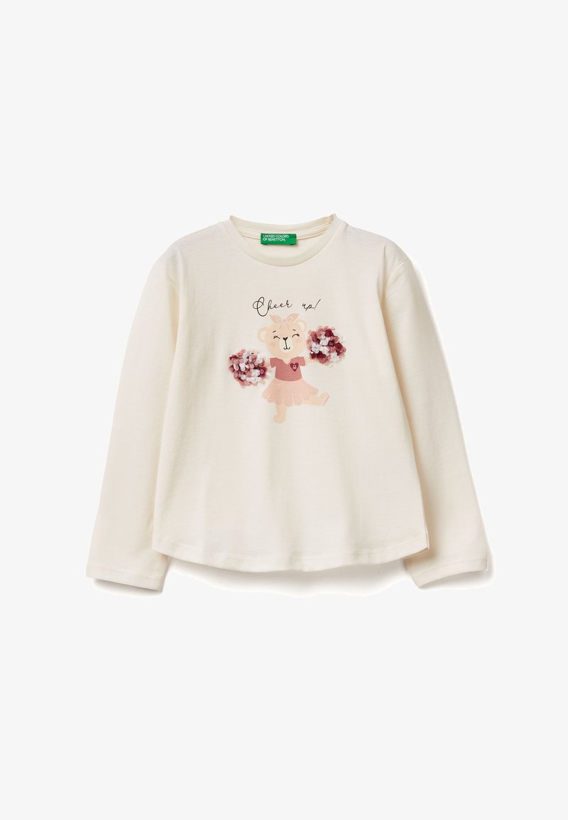 Krémová košile s dlouhým rukávem vyrobená z měkké bavlny, která obsahuje potisk s medvědím charakterem, bambulkami, detailem ve tvaru srdce a textem "Rozvesel se!"