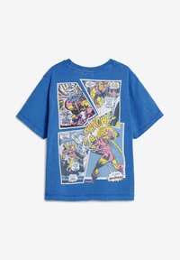 Blue cotton t-shirt featuring comic book illustrations on the back with vibrant colors, bold patterns, and text elements in a retro style.