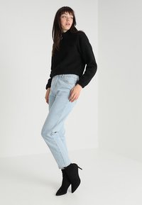 Urban Classics LADIES SHORT SHERPA TROYER - Flisinis džemperis - black