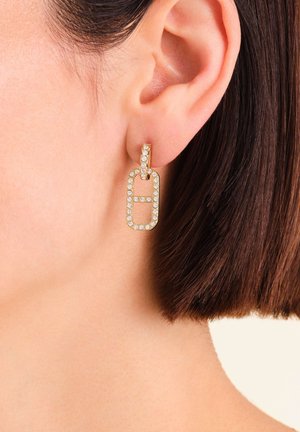 Gold-tone hoop earrings with a rectangular design, embellished with clear rhinestones, hanging from a small latch. Textured metal finish.