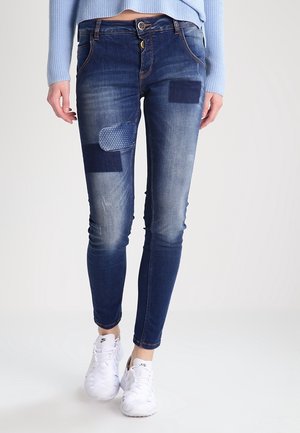 Jean slim - destroyed denim