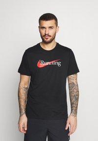Nike Performance Camiseta estampada - black