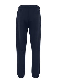 Marineblauwe sweatpants met een elastische tailleband, taps toelopende onderkant en ribgebreide boorden. Gemaakt van zachte, rekbare stof, geschikt voor casual gebruik.