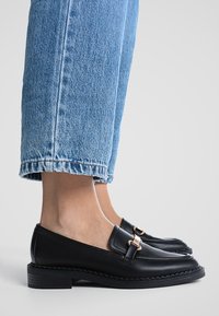 Stradivarius Slip-ons - black