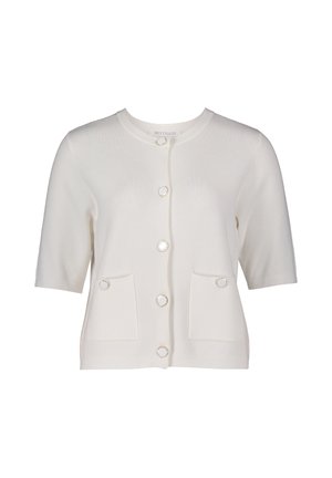 Kremowy kardigan z krótkim rękawem, z dwiema przednimi kieszeniami z okrągłymi akcentami oraz rzędem guzików z przodu.