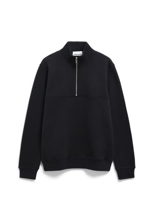 Sweatshirt zippé noir en tissu doux, avec un col haut, une coupe décontractée et un discret logo sur la poitrine.