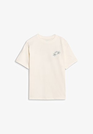 Prosty kremowobiały t-shirt z krótkim rękawem z małym czarnym nadrukiem kraba na górnej lewej części klatki piersiowej.