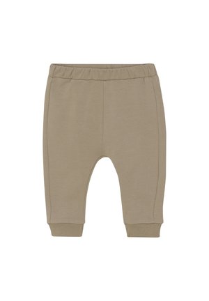 Beige Baumwoll-Jogginghosen für Kleinkinder mit einem elastischen Bund, gerippten Bündchen und seitlichen Nähten. Weiche, glatte Textur, taillierte Beinform.