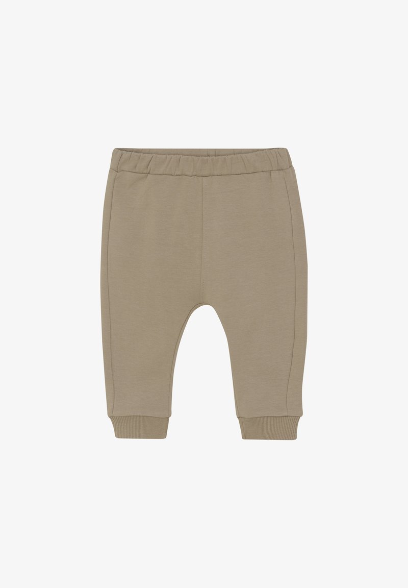 Beige Baumwoll-Jogginghosen für Kleinkinder mit einem elastischen Bund, gerippten Bündchen und seitlichen Nähten. Weiche, glatte Textur, taillierte Beinform.