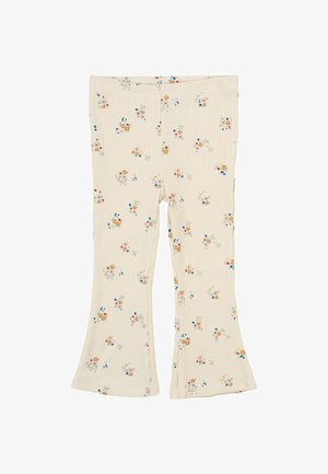 Legginsy z szerokimi nogawkami z prążkowanego materiału w kremowym kolorze z kwiatowym nadrukiem w pastelowych odcieniach. Posiadają elastyczny pas i dekoracyjne przeszycia.