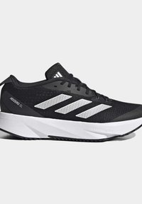 Black athletic shoe with mesh upper, three white stripes design, padded collar, and white midsole. Lightweight construction suitable for running.