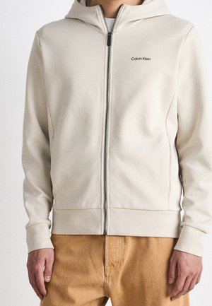 Tröja med dragkedja - beige