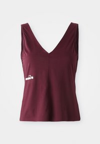 Camiseta sin mangas de deporte en color burdeos con escote en V y logo blanco "adora" en el lado izquierdo del frente, sobre un fondo blanco.