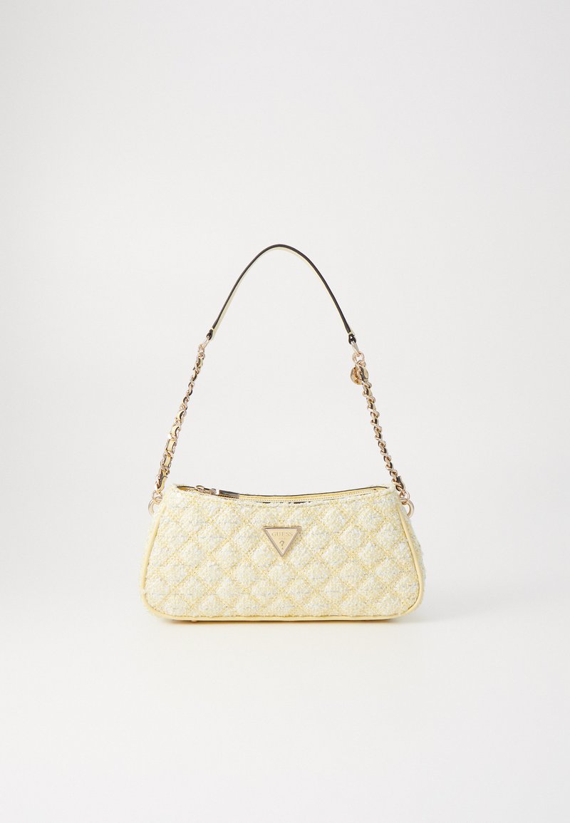 Keltatusta keltaisesta käsilaukusta, jossa on kolmiomainen logo, kultaiset yksityiskohdat, ketjuhihna ja ylhäältä avattava vetoketju. Pintarakenteessa on hieno kiilto.