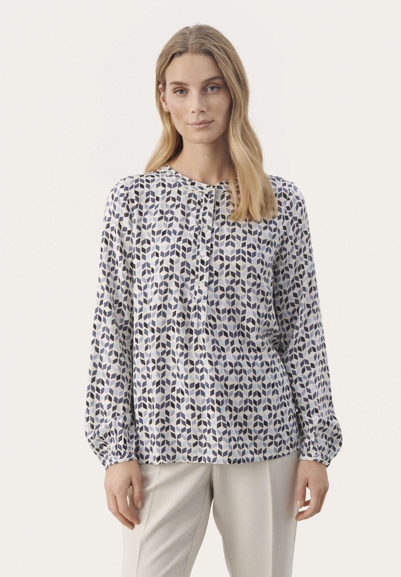 Langärmlige Bluse aus leichtem Stoff mit geometrischem Muster in Blau- und Cremetönen, runder Ausschnitt und Knopfleiste.