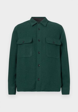 Grøn, struktureret skjortejakke med krave, to forlommer og sorte knapper, lavet af et blødt, vævet materiale.