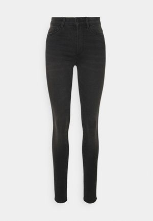 Czarne dżinsy skinny z wysokim stanem, z pięcioma kieszeniami, delikatnym wyblaknięciem i gładką, elastyczną teksturą.