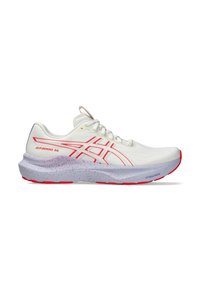 White athletic shoes with red accents, featuring a mesh upper, cushioned sole with speckled texture, and prominent branding on the side.