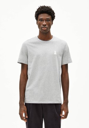 Gray cotton T-shirt with a crew neck and short sleeves. Features a small white ribbon logo on the left chest. Minimalist design.