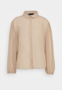 Chemise beige à boutons avec un motif à pois texturé, manches longues avec des poignets élastiques et un col classique. Matériau léger.
