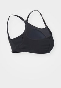 Schwarzer Sport-BH mit verstellbaren Trägern, geschwungenem Ausschnitt und atmungsaktivem Stoff mit strukturierten Akzenten. Nahtloses Design für maximalen Komfort.