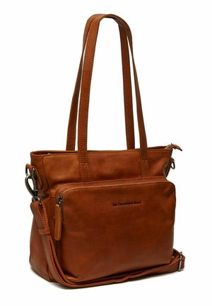 Brown leather tote bag with two long handles, a detachable shoulder strap, and a front zip pocket. Features a smooth texture.