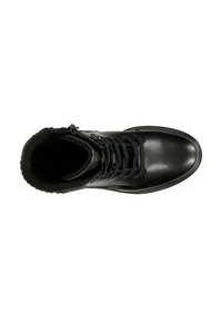 Schwarze Lederstiefel mit Schnürdesign, flauschigem schwarzen Innenfutter und glattem Obermaterial. Sie verfügen über ein dezentes Logo und eine flache Gummisohle.