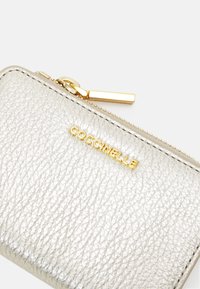 Coccinelle Wallet - pale gold