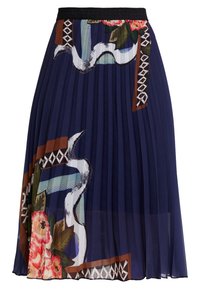 Gonna plissettata blu navy con motivi floreali e astratti, elastico nero in vita, tessuto leggero e trasparenza all'orlo.