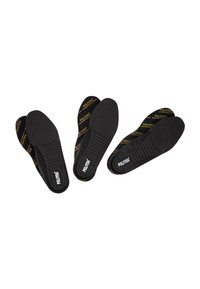 Black insoles with textured surface, featuring yellow printed branding "POLYOUS." Contoured shape for comfort and support.