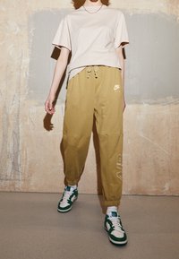 Nike Sportswear Žerzejové šaty - beige