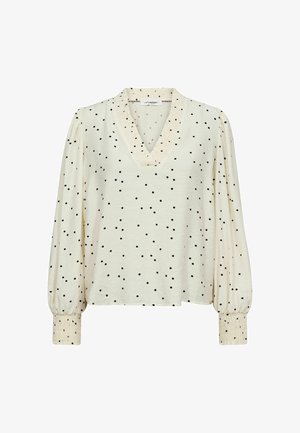 Roomwitte blouse met lange mouwen en zwarte polka dots, V-hals met ruches, gerimpelde manchetten en een losse pasvorm.