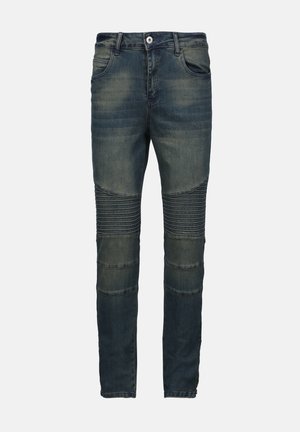 Verwaschene, blaue Jeans im Slim-Fit, mit gerippten Akzenten an den Knien und klassischem Fünf-Taschen-Design. Knopf- und Reißverschluss an der Taille.