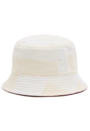Chapeau bob en tissu doux crème et blanc avec bord cousu et deux petits œillets de ventilation sur le côté.