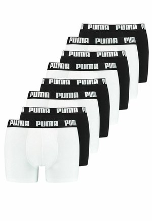 Set aus acht Boxershorts in Schwarz und Weiß. Hergestellt aus Baumwolle, mit einem elastischen Bund und dem weißen "PUMA"-Logo.