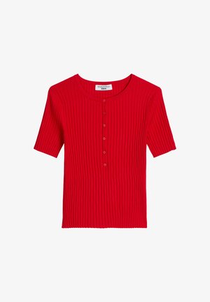 Top court en maille rouge côtelée à manches courtes avec encolure ronde et patte de boutonnage devant comportant six boutons.