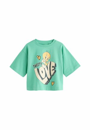 Mint zelena kratka majica s kratkimi rokavi, ki prikazuje grafiko ptice Tweety z besedilom "TWEETY LOVE" in majhnimi srčkami v črni in rumeni barvi.