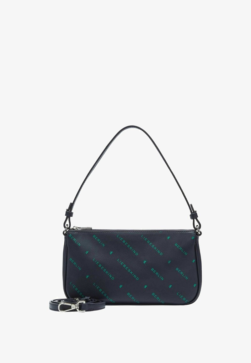 Sac à main en cuir bleu marine avec fermeture éclair, comportant un motif de logo vert répétitif. Inclut une bandoulière amovible.