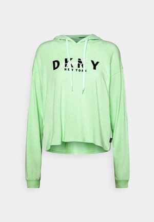Jasnozielona skrócona bluza z kapturem z długimi rękawami i sznurkami, z napisem „DKNY Story New York” w czerni i bieli na piersi.