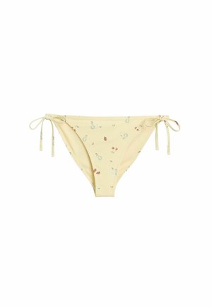 Hellgelber Bikinihöschen mit kleinen Fruchtmotiven und verstellbaren Seitenschnüren auf weißem Hintergrund.