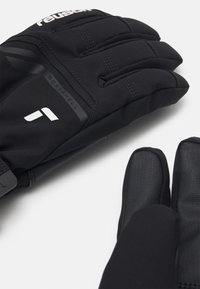 Gants en softshell noir avec des accents en cuir, dotés de quatre doigts et d'un ajustement confortable. Comprend le logo imprimé en blanc sur la surface.