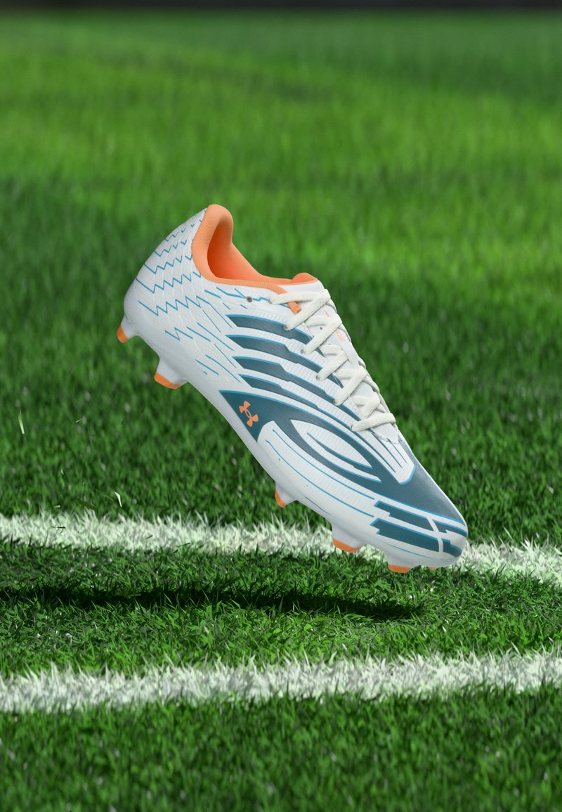 Botines de fútbol para terreno firme