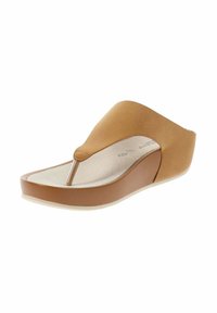 Sandalo slip-on marrone con una morbida fascia superiore, un inserto per le dita dei piedi e una suola spessa di colore chiaro. Forma arrotondata con un leggero design a zeppa.