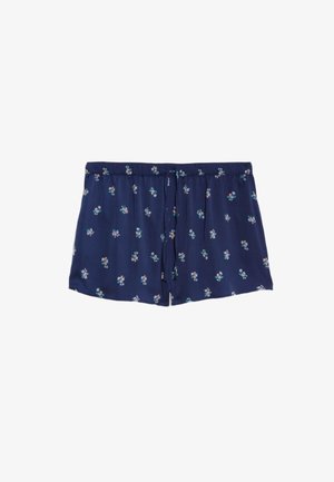 Marineblå shorts lavet af blødt stof med et blomstermønster. Udstyret med en elastisk talje og snore. Korte og lette i designet.