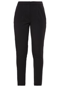 Svarta byxor med slim fit, som har en mjuk textil, två framfickor, skarvar och en midja.