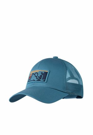 Blue mesh trucker cap with curved brim and front patch showing abstract mountain and sunset design.