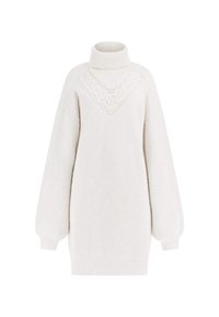 Abito maglione bianco a maglia con colletto alto, maniche a sbuffo e un motivo in pizzo decorativo sul petto. Vestibilità strutturata e over-size.